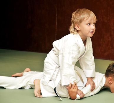 aikido boys are fighting for the competition
