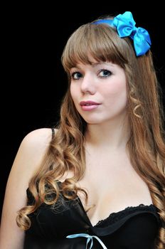 blue-eyed pin-up sexy girl over black background