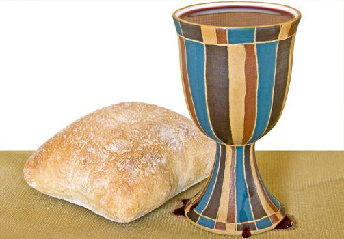 Wine and bread for holy communion. Includes clipping path for white background.