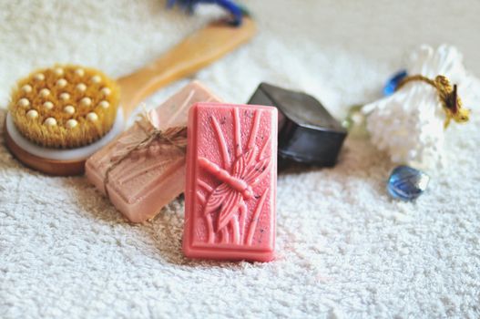 handmade soap bars with other elements of spa over white