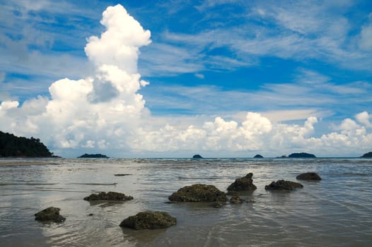 The chain of rocks on the tropical lagoon 