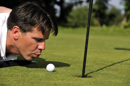 Man playing golf