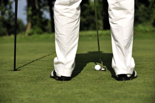 Man playing golf
