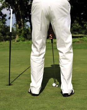 Man playing golf