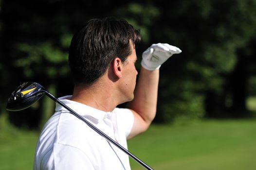 Man playing golf