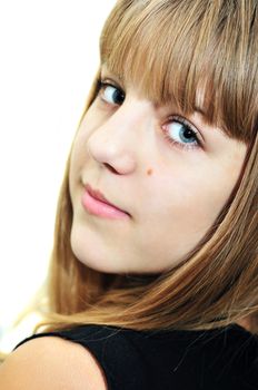 Closeup portrait of teen smiling girl, soft focus 
