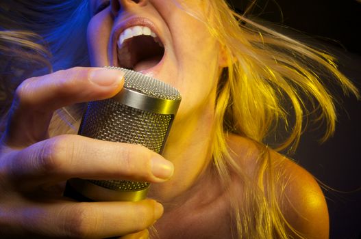 Woman with Microphone Sings with Passion