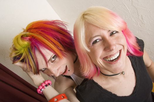 Two hip girls with brightly coloroed hair