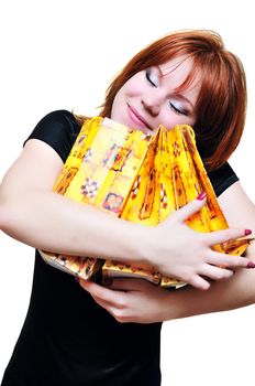  redheaded laughing girl after shopping over the white
