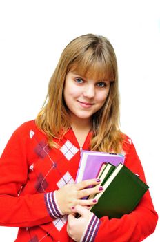 pretty teen girl holding books over white
