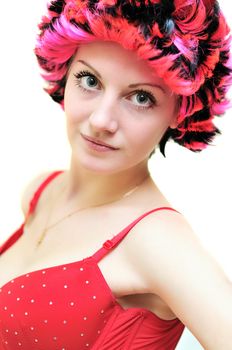 Beautiful smiling helloween  girl wearing red wig 
