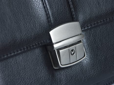 The image of the lock on a portfolio close up