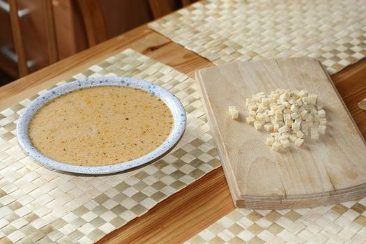 cheese soup with some croutons