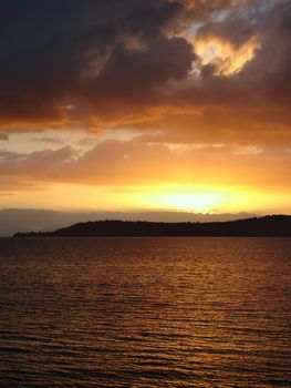 Clouds with a Silver Lining - Sunset over Lake Taupo (volcanic crater), Taupo, New Zealand