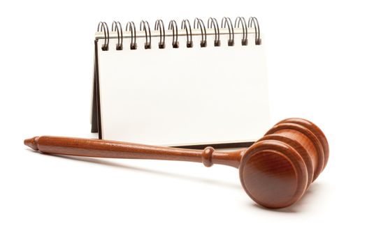 Blank Spiral Note Pad and Gavel Isolated on White.