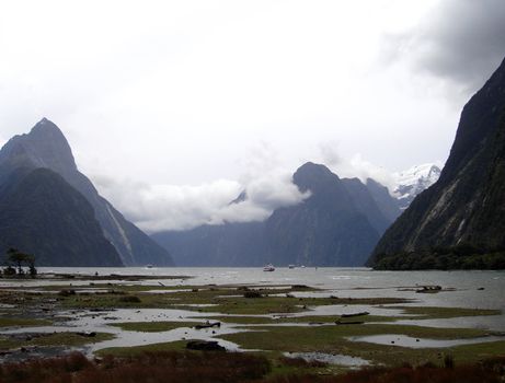 Mitre Peak within Milford Sound, New Zealand.  Te Wahipounamu World Heritage Site