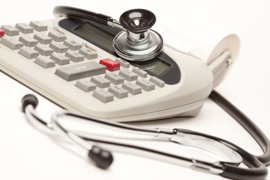 Black Stethoscope on a Calculator with Selective Focus.