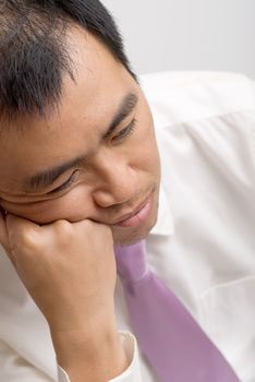 Business man tired and sleeping on white background.