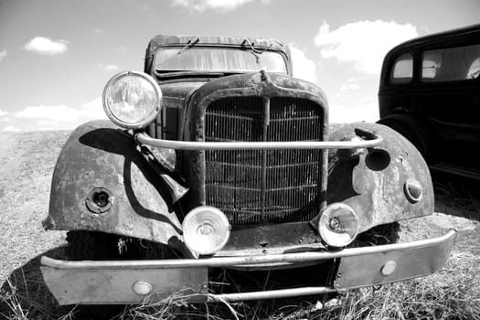 old rusty car on the roadside