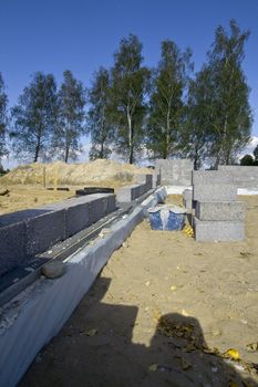 The building site where begins construction of the new house