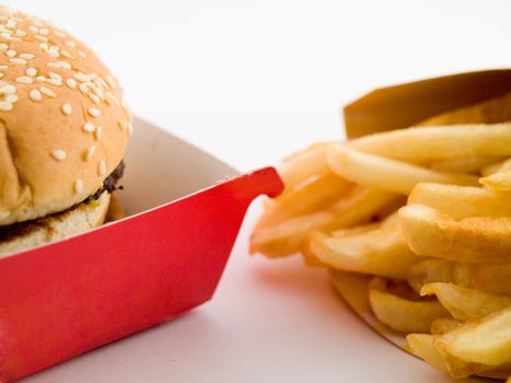 Burger and Fries in Cardboard Fast Unhealthy Food on White Background