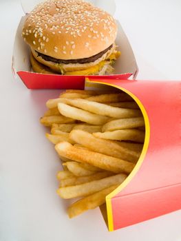 Burger and Fries in Cardboard Fast Unhealthy Food on White Background