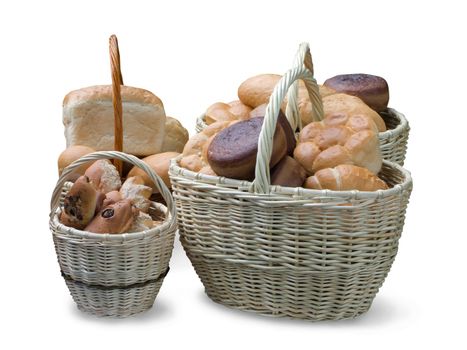 Bread is in the wattled baskets on white. Isolated whith clipping path