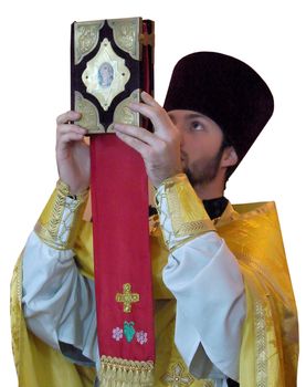 Orthodox priest rising ancient Holy Gospel 