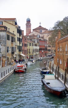 A quiet side canal in Venice, Italy.