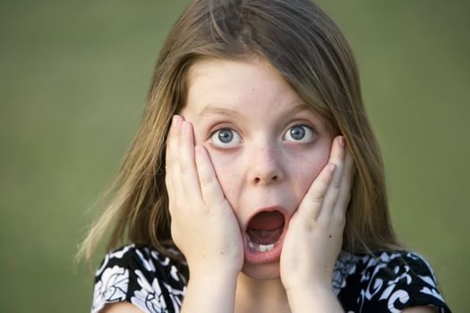 Pretty Young Girl with Freckles and a Shocked Expression