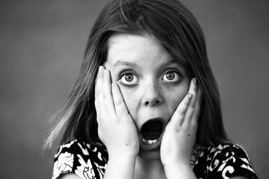 Pretty Young Girl with Freckles and a Shocked Expression