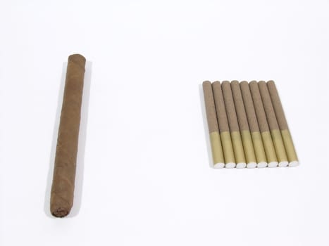 One large cigar beside a line of cigarillos