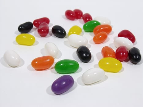 Large variety of jelly beans on a white table