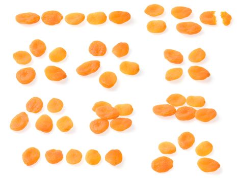 Groups of dried apricots  over white background.