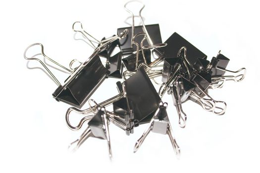 pile of assorted sized bull clips
