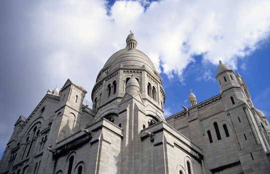 View of the domes of Sacre Coeur, Paris, France, from below.