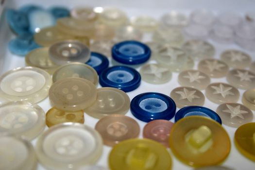 assorted buttons of different colors and size