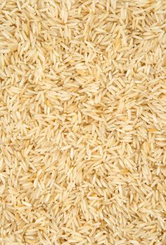 Uncooked basmati rice background. Abstract food textures.