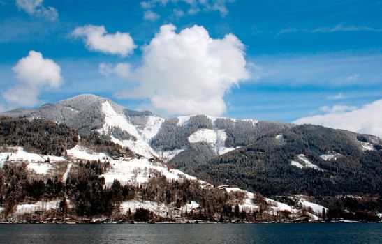 Tranquil Alpine lake scenery in Switzerland.