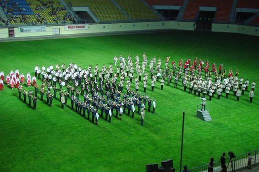 military orchestra band Marching and playing on green, grass, field