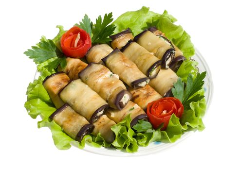 close-up rolls from eggplant on salad leaves