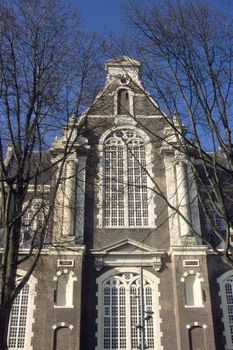 Arched windows of Westerkerk, Western Church, in Amsterdam, The Netherlands.