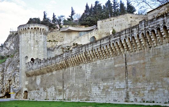 The ancient stone city wall of Avignon, France.