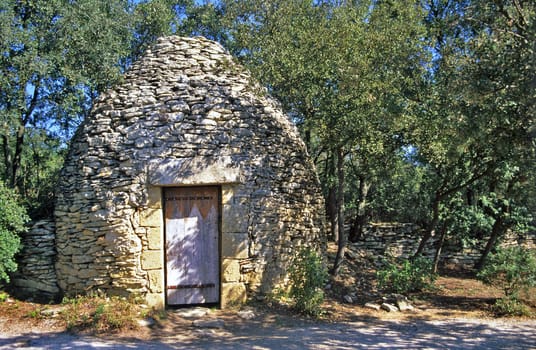 Ancient farming huts called capitelles are scattered across the Provence region of France.