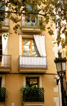 The mild Mediterranean weather allows inhabitants of Barcelona, Spain to hang their curtains outdoors.