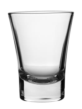 An empty shot glass on white background.