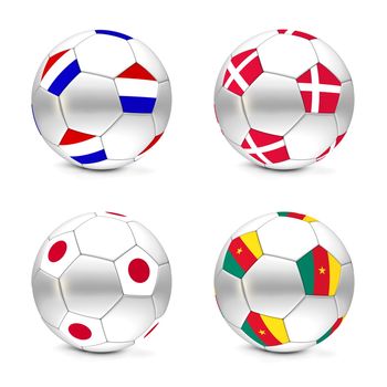 four footballs/soccer balls with the flags of Netherlands, Denmark, Japan and Cameroon - world championship South Africa 2010 group E