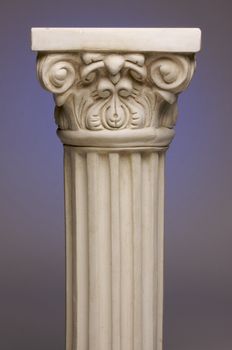 Ancient Column Pillar Replica on a Blue Gradation Background.