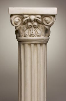 Ancient Column Pillar Replica on a Grey Gradation Background.