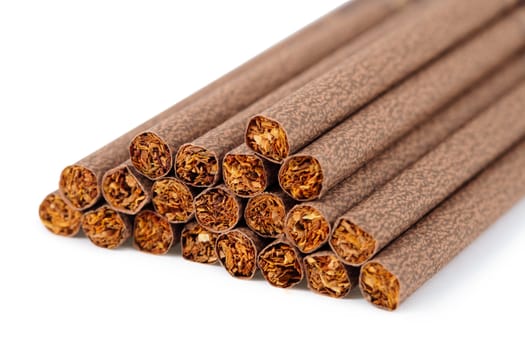 A handful of brown ladies cigarette on a white background